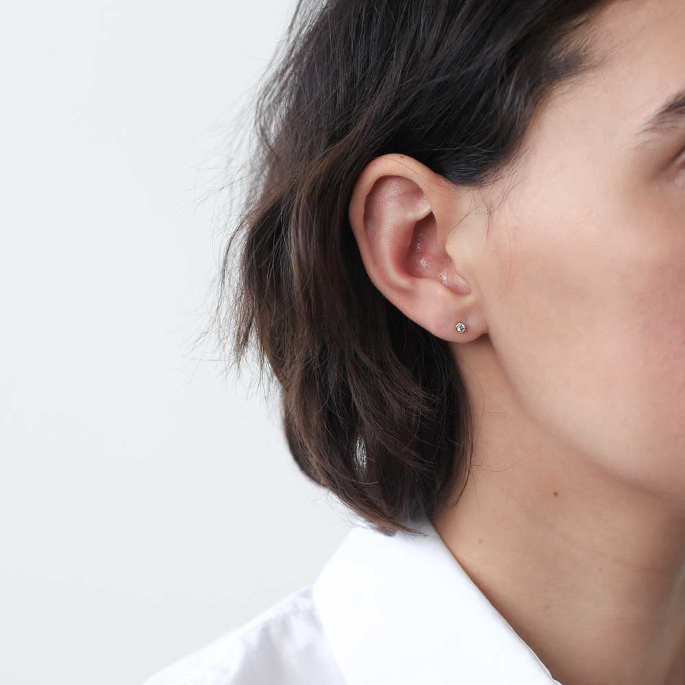 Tiny Diamond Studs in 14k Gold (Gold) on model