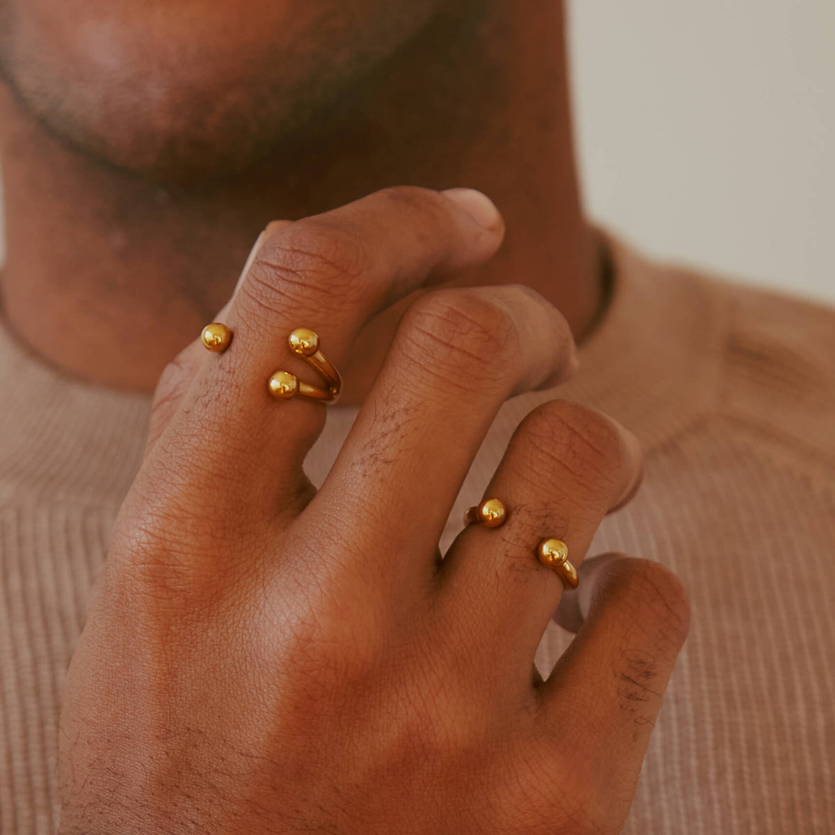 Floating Orb Ring II and III (gold) on Model