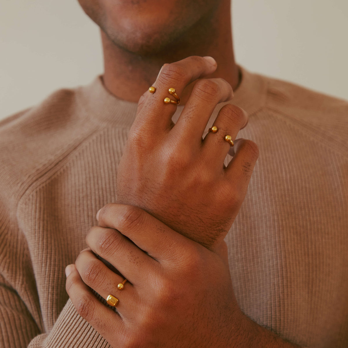 Floating Orb Ring II and III and Floating Orb Signet Ring (Gold) on Model