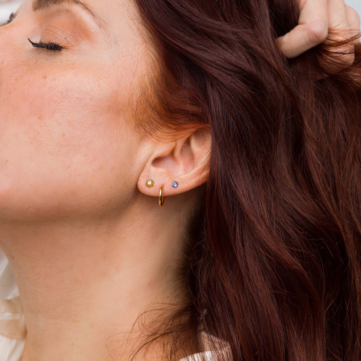Classic Huggie Hoops, 11mm and Deco and Sapphire Nap Earrings (Gold) on model