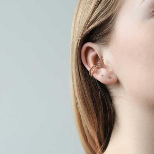 Shooting Star Open Hoops and Trinity Threaded Flat Back Earring in 14k Gold on model