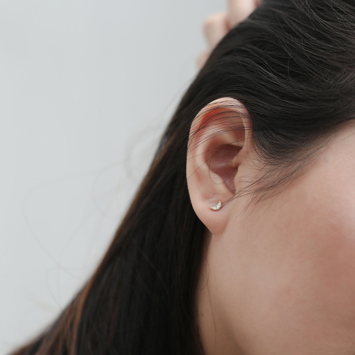 Pave Moon Studs on model (Titanium - Gold)