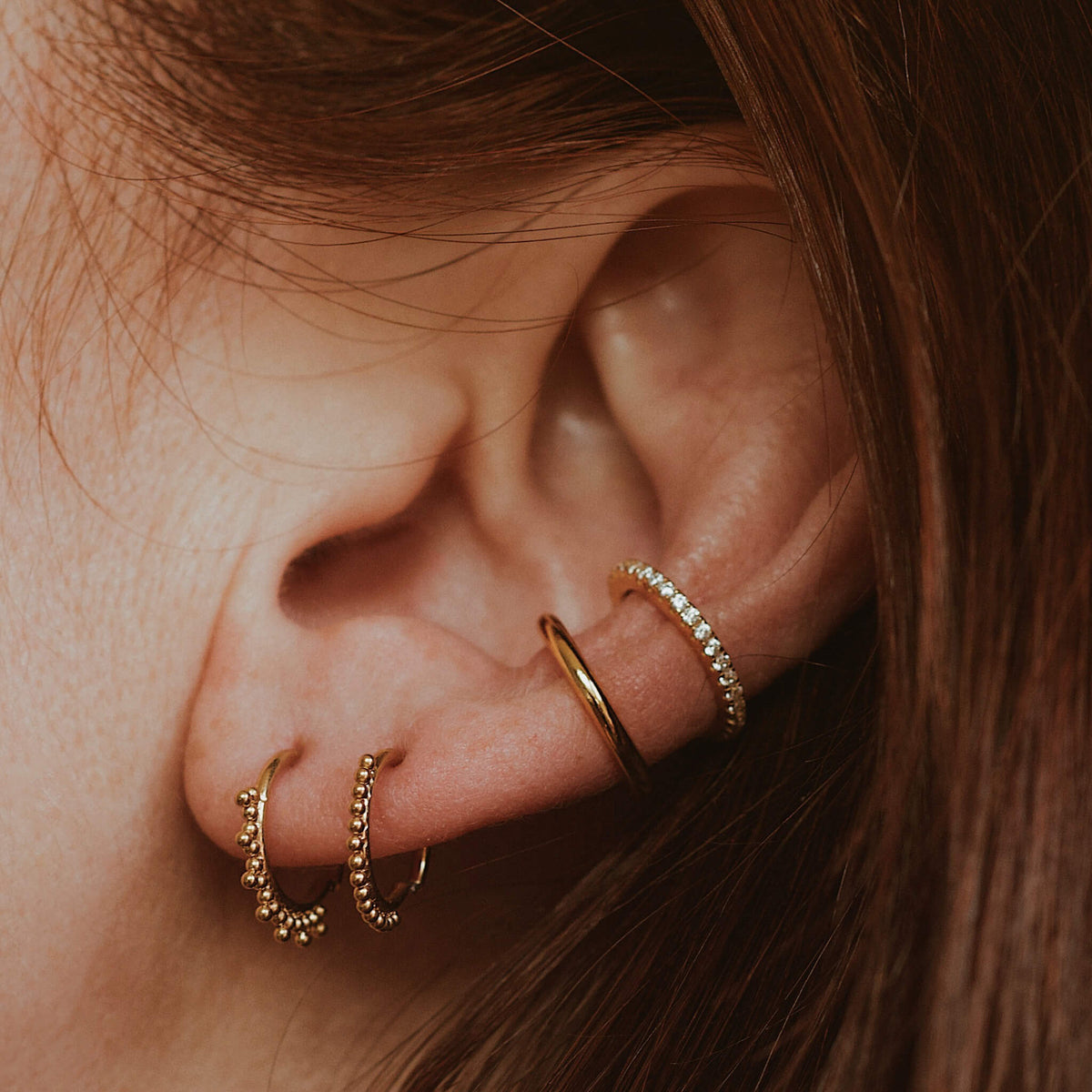 Goddess Cartilage Hoop (Titanium - Gold) on model