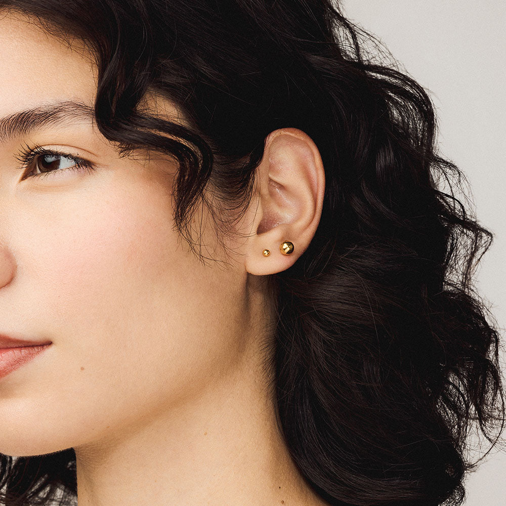 Sphere Nap Earrings, 3mm and 6mm (Gold) on model