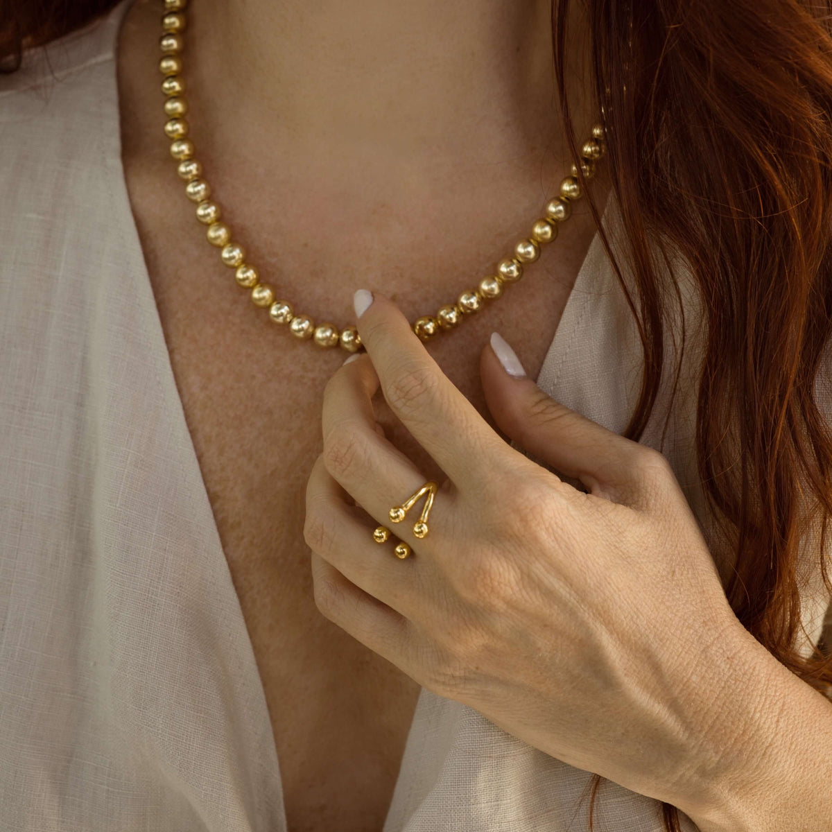 Floating Orb Ring IV (Gold) on model
