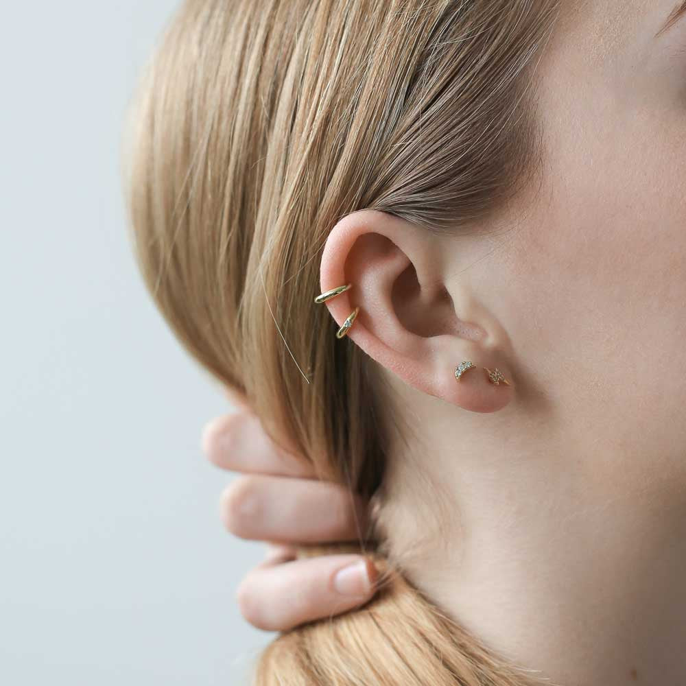 Classic Cartilage Hoop, Pave Lightning and Pave Moon Threaded Flat Back Earring (Titanium - Gold) on model