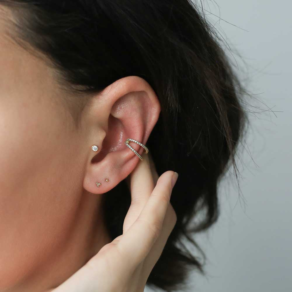 Celestial Crystal Bezel Solitaire Push Pin Flat Back Earring and Trinity Studs in 14k Gold on model