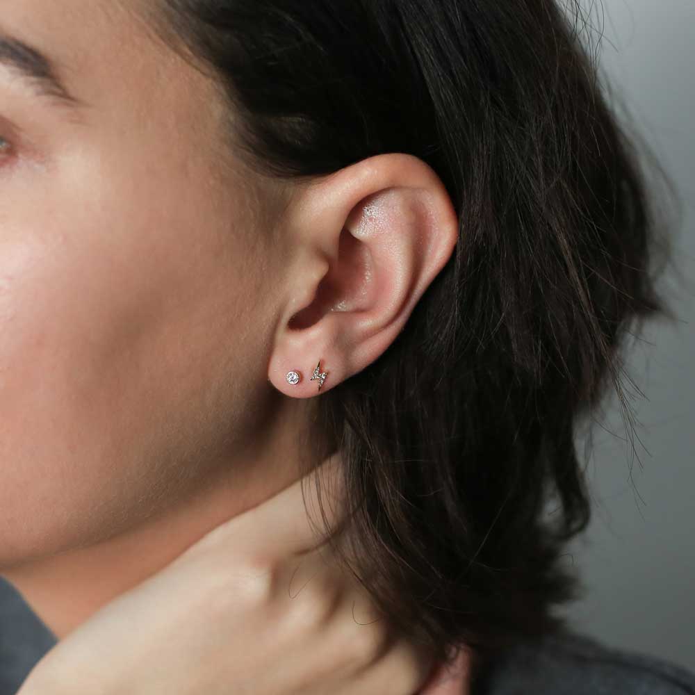 Celestial Crystal Bezel Solitaire Nap Earrings and Pave Lightning Nap Earrings (Gold) on model