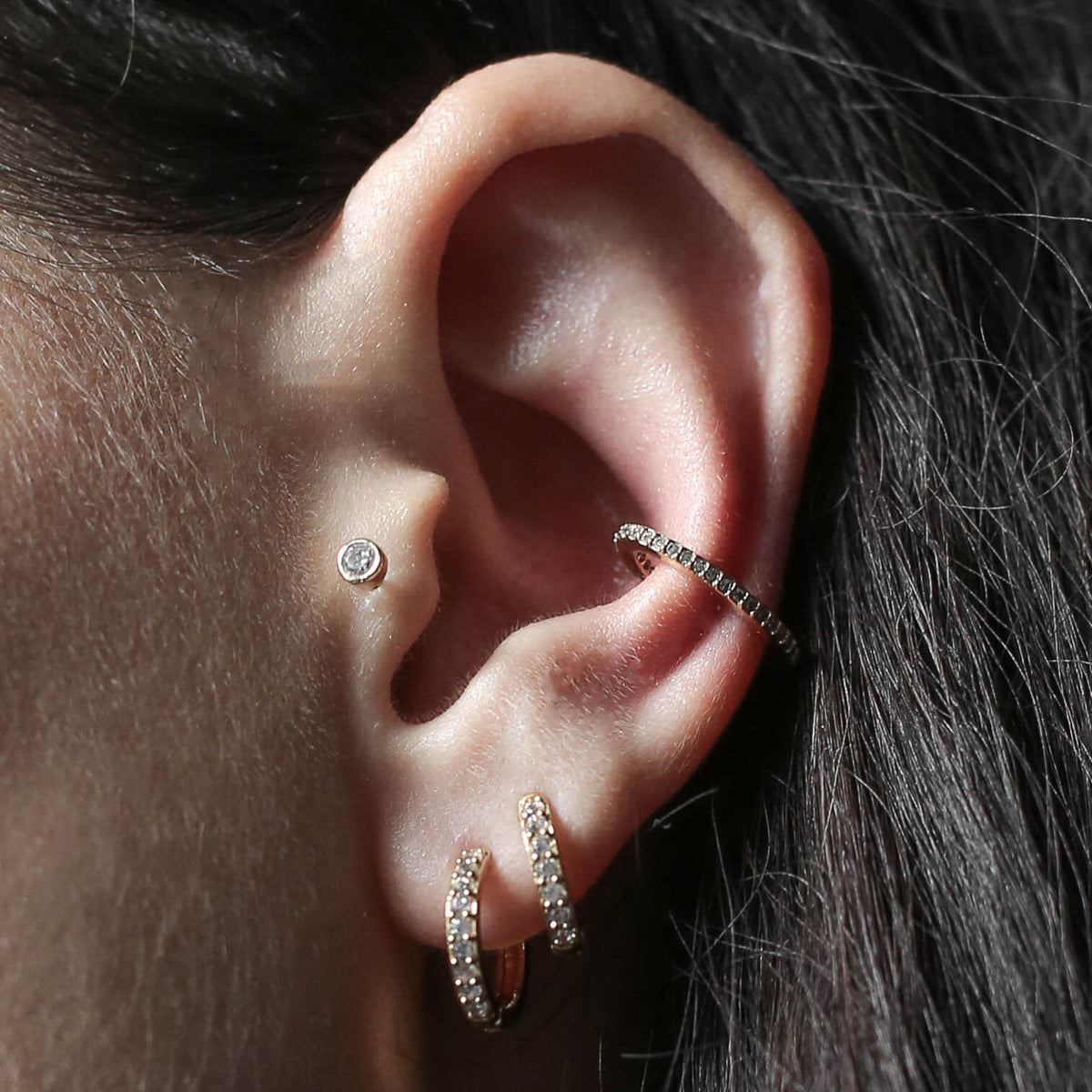 Pave Huggie Hoops, 11mm and Celestial Crystal Bezel Solitaire Threaded Flat Back Earring (Titanium - Gold) on model